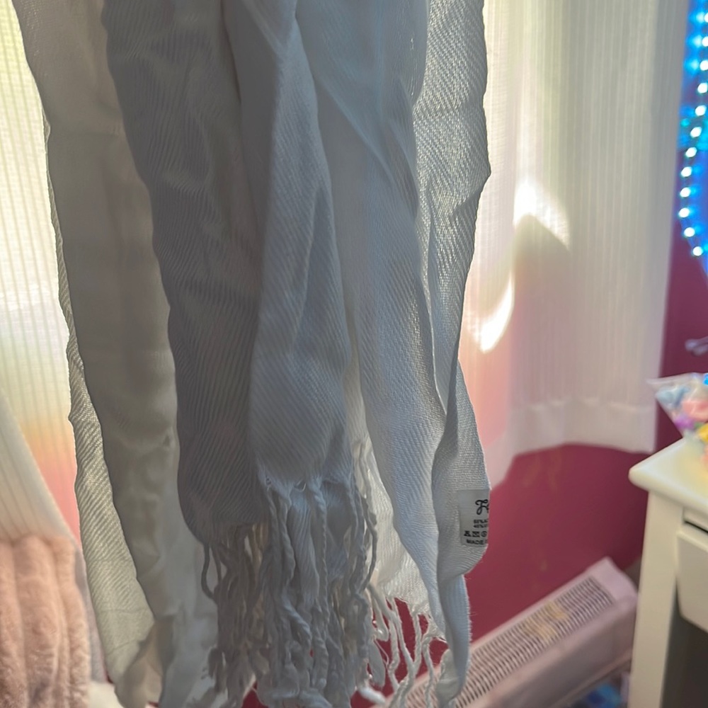 White fringed scarf